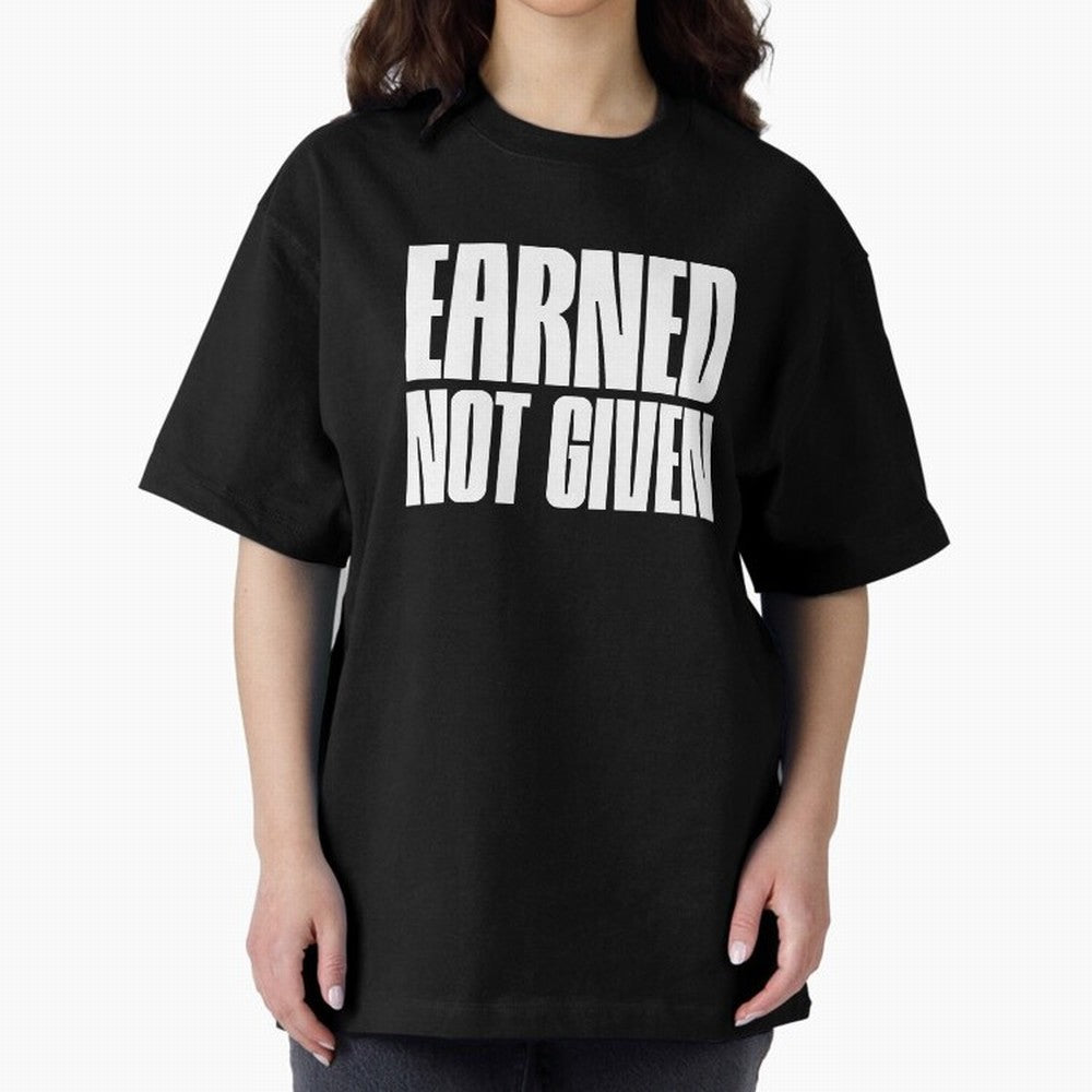 Earned not given white Oversized T-Shirt Celebrate Football Dreams Across FIFA World Cup 2026 Spirit, Built around Spain, Mbappe, Football Passion, Legendary Performances, Festival Vibes and Supporter Community; Built for Supporters Chasing Trophy