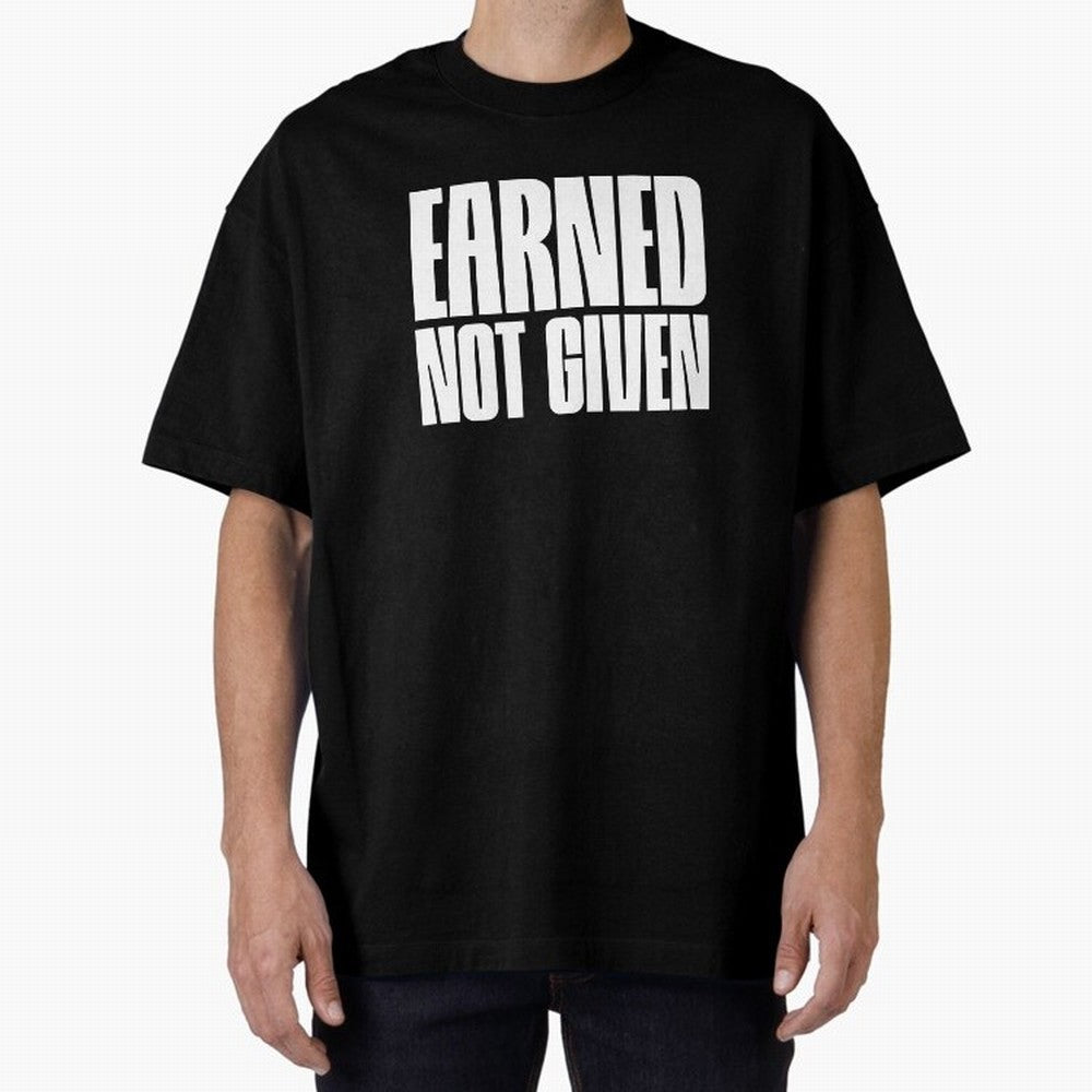 Earned not given white Oversized T-Shirt Celebrate Football Dreams Across FIFA World Cup 2026 Spirit, Built around Spain, Mbappe, Football Passion, Legendary Performances, Festival Vibes and Supporter Community; Built for Supporters Chasing Trophy
