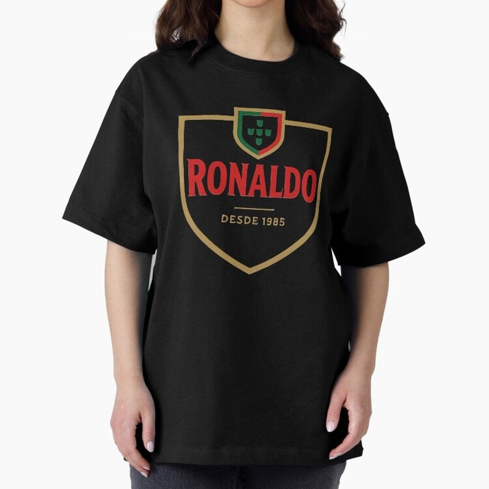 Ronaldo Emblem Sticker ¨C Gold Crest Parody Design Oversized T-Shirt Remember Iconic Moments from FIFA World Cup 2026 Group Stage for Fans of Messi and Cristiano Ronaldo and Spain, Bringing Football Festival Excitement, Trophy Ambitions, Country