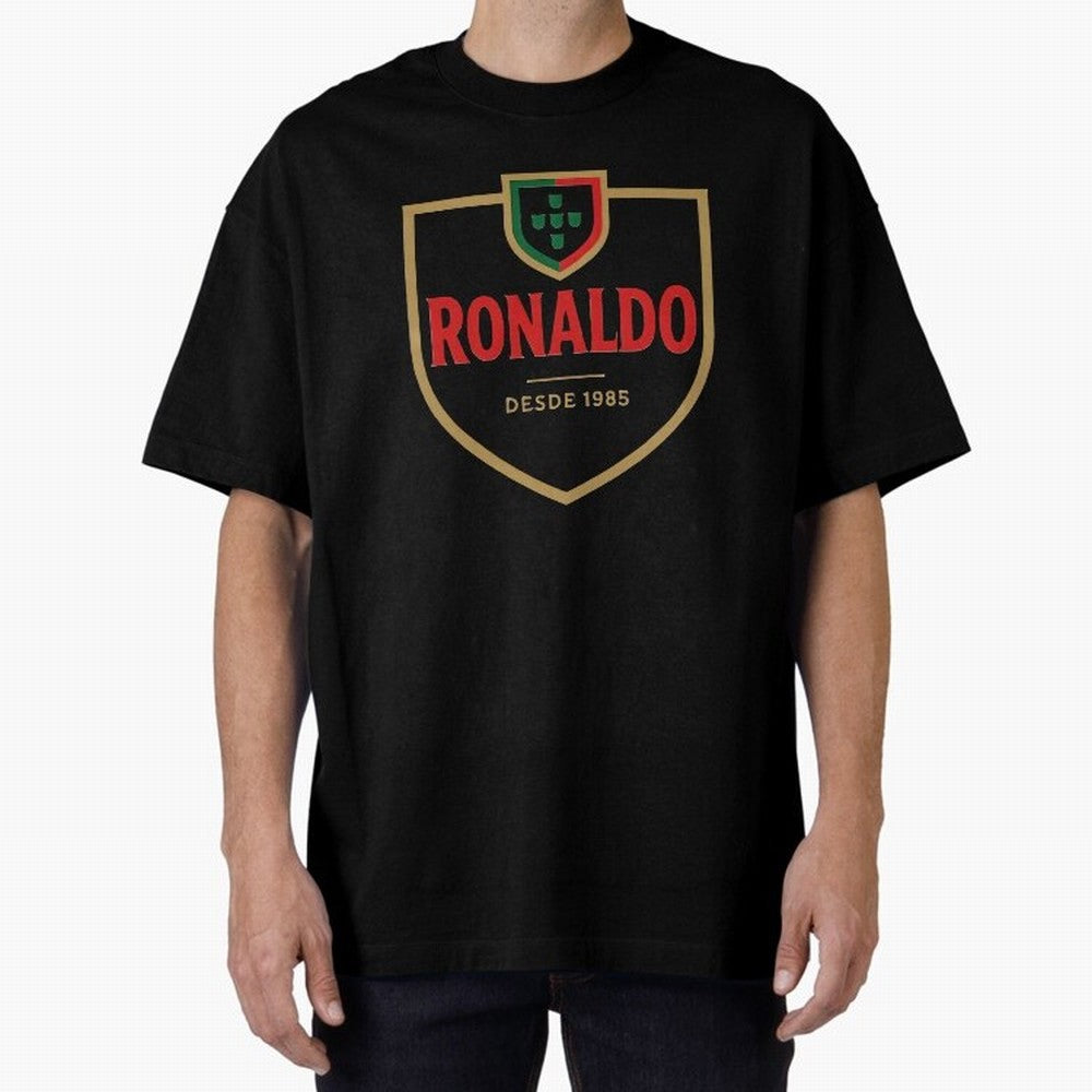 Ronaldo Emblem Sticker ¨C Gold Crest Parody Design Oversized T-Shirt Remember Iconic Moments from FIFA World Cup 2026 Group Stage for Fans of Messi and Cristiano Ronaldo and Spain, Bringing Football Festival Excitement, Trophy Ambitions, Country