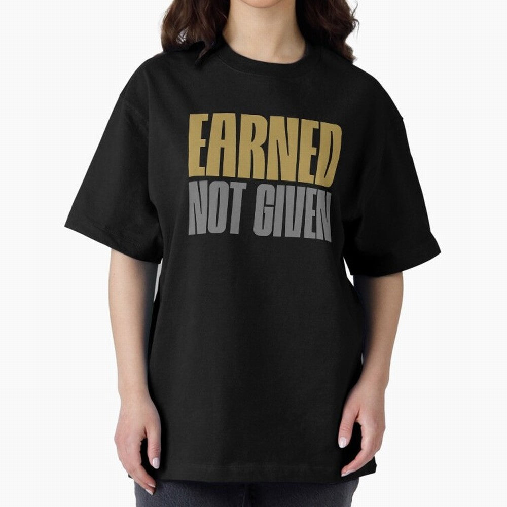Earned not given Oversized T-Shirt Showcase Global Football Passion for FIFA World Cup 2026 Group Stage, Filled with Messi and Cristiano Ronaldo, England, Supporter Pride, Iconic Celebrations, Legendary Names and Global Match Day Energy; Ideal for