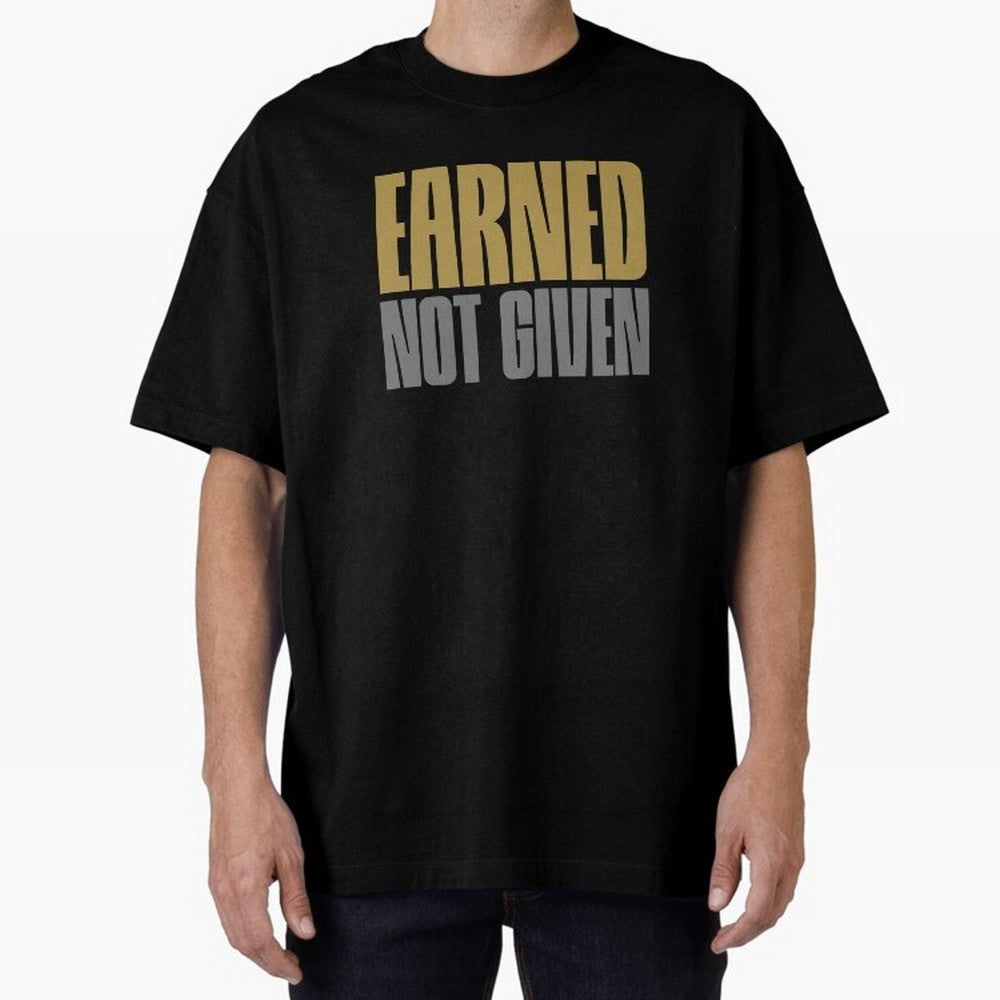Earned not given Oversized T-Shirt Showcase Global Football Passion for FIFA World Cup 2026 Group Stage, Filled with Messi and Cristiano Ronaldo, England, Supporter Pride, Iconic Celebrations, Legendary Names and Global Match Day Energy; Ideal for