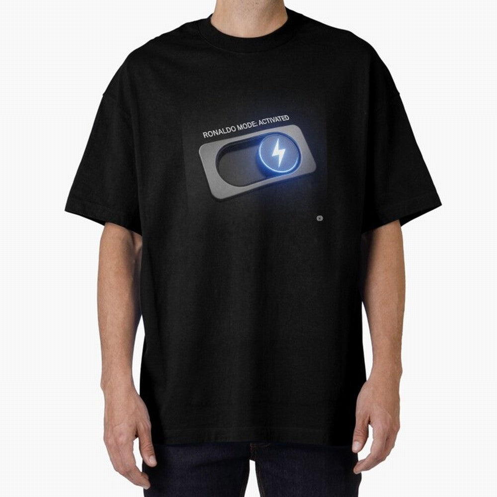 Ronaldo Mode: Activated ¨C Power Switch Football Art Oversized T-Shirt Relive Legendary Nights from the FIFA World Cup 2026 USA Canada Mexico Journey through Messi, CR7 and Mbappe Highlights, Brazil Pride, Worldwide Fan Energy, Dramatic Goals,